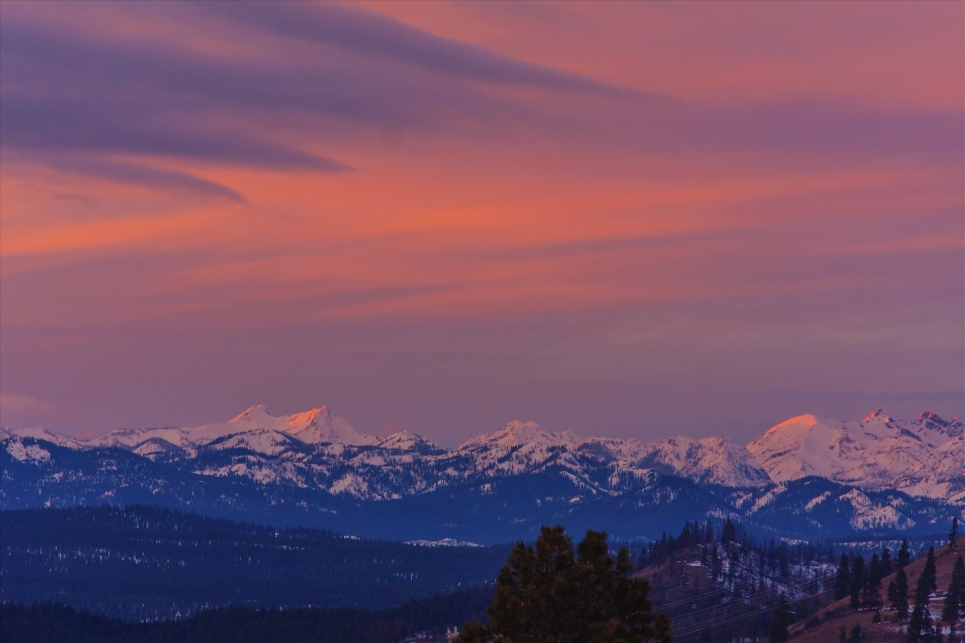 Sunset Over the Stuarts - The mountains are the icon Stuart Range in Central Washington.  This was taken at sunset, as the clouds lit up and the setting sun shone on the snow capped peaks. by Bear Conceptions Photography