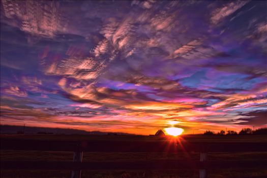 A Summer Sunset - This is a 300 shot stack of the sunset. Done this way to get the movement of the clouds with all the color.